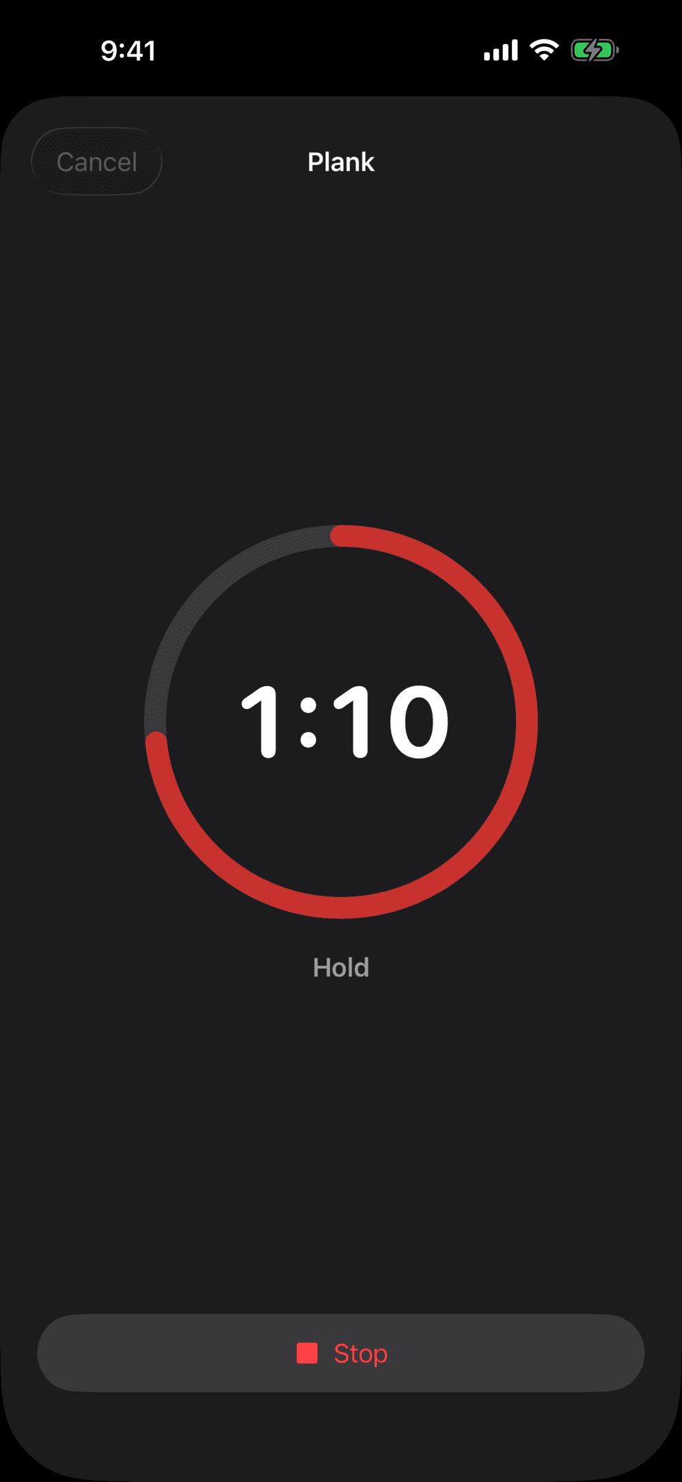 The hold timer in dark appearance, a large red ring around a 1:10 countdown for a plank.